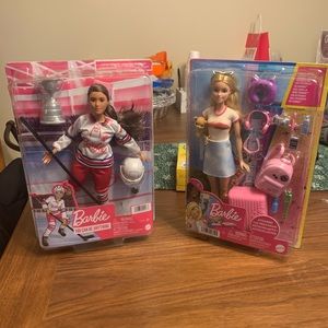 Two new Barbie’s both in box. Malibu travel Barbie and Hockey Barbie